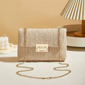 The Classic Lock-Clasp Straw Bag